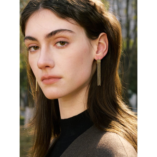 Solène Gold Tassel Huggie Earrings
