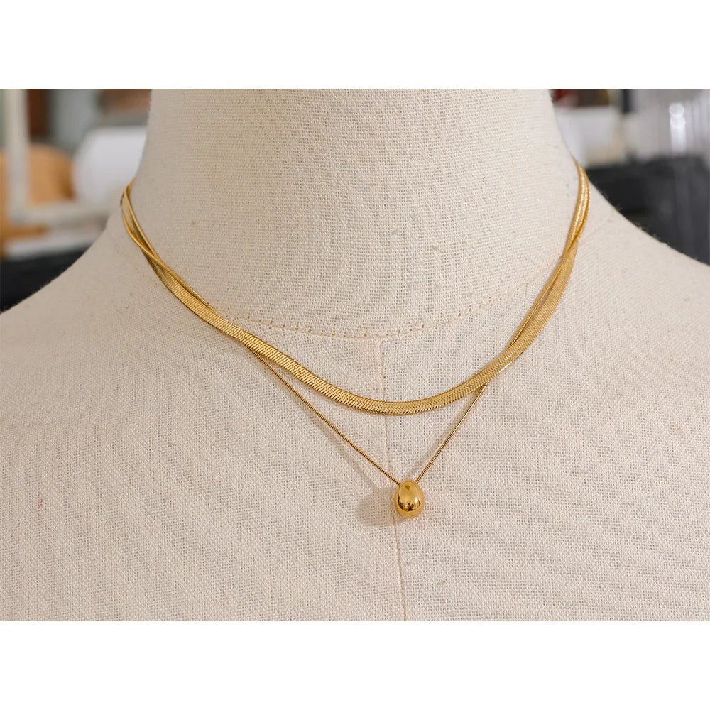 Aurelia Layered Herringbone & Egg Pendant Necklace