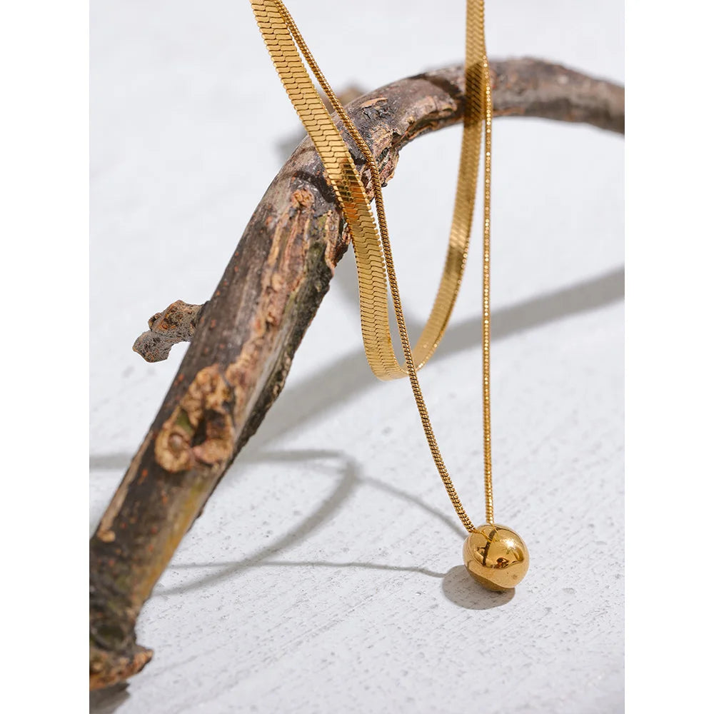Aurelia Layered Herringbone & Egg Pendant Necklace